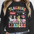 Teaching Future Leaders Groovy Teacher Back To School Unisex Sweatshirt, novelty gifts, funny gifts