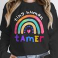 Tiny Human Tamer Watercolor Rainbow Daycare Teacher Unisex Sweatshirt, novelty gifts, funny gifts Tiny Human Tamer Watercolor Rainbow Daycare Teacher Unisex Sweatshirt, novelty gifts, funny gifts