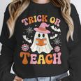 Trick Or Teach Cute Floral Ghost Teacher Halloween Costume Unisex Sweatshirt, novelty gifts, funny gifts