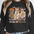 Trick Or Teach Groovy Teacher Halloween Floral Ghost Unisex Sweatshirt, novelty gifts, funny gifts