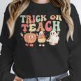 Trick Or Teach Pumpkin Candy Corn Ghost Halloween Teacher Unisex Sweatshirt, novelty gifts, funny gifts