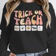 Trick Or Teach With Symbols Special Education Teacher Spooky Unisex Sweatshirt, novelty gifts, funny gifts Trick Or Teach With Symbols Special Education Teacher Spooky Unisex Sweatshirt, novelty gifts, funny gifts