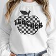 Back To School Checkered Apple Teacher Checkerboard Teacher For Men Women Girls Kids Unisex Sweatshirt, novelty gifts, funny gifts Back To School Checkered Apple Teacher Checkerboard Teacher For Men Women Girls Kids Unisex Sweatshirt, novelty gifts, funny gifts