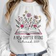 Floral Book a New Chapter Begins Retired Retirement Teacher Unisex Sweatshirt, novelty gifts, funny gifts Floral Book a New Chapter Begins Retired Retirement Teacher Unisex Sweatshirt, novelty gifts, funny gifts