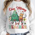 One Merry Teacher Groovy Christmas Tree Pjs Xmas Teacher Unisex Sweatshirt, novelty gifts, funny gifts One Merry Teacher Groovy Christmas Tree Pjs Xmas Teacher Unisex Sweatshirt, novelty gifts, funny gifts