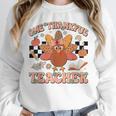 One Thankful Teacher Thanksgiving Retro Groovy Fall Teachers Unisex Sweatshirt, novelty gifts, funny gifts