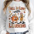Retro Fall In Love With Learning Autumn Pumpkin Teacher Kids Unisex Sweatshirt, novelty gifts, funny gifts Retro Fall In Love With Learning Autumn Pumpkin Teacher Kids Unisex Sweatshirt, novelty gifts, funny gifts