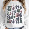Retro IT'S ME Hi I'm The TEACHER Groovy Testing Squad Pink Unisex Sweatshirt, novelty gifts, funny gifts
