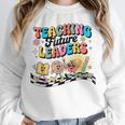 Retro Teaching Future Leaders Groovy Teacher Back To School Unisex Sweatshirt, novelty gifts, funny gifts Retro Teaching Future Leaders Groovy Teacher Back To School Unisex Sweatshirt, novelty gifts, funny gifts