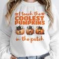 I Teach The Cutest Pumpkins Halloween Teacher Cat Lover Unisex Sweatshirt, novelty gifts, funny gifts I Teach The Cutest Pumpkins Halloween Teacher Cat Lover Unisex Sweatshirt, novelty gifts, funny gifts