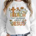 I Teach Tiny Humans About Jesus Christian Teacher Religious Unisex Sweatshirt, novelty gifts, funny gifts I Teach Tiny Humans About Jesus Christian Teacher Religious Unisex Sweatshirt, novelty gifts, funny gifts