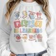 Teacher Groovy Play Is Learning Back To School Unisex Sweatshirt, novelty gifts, funny gifts