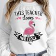 This Teacher Loves Her Flock Cute Flamingo Teacher Unisex Sweatshirt, novelty gifts, funny gifts This Teacher Loves Her Flock Cute Flamingo Teacher Unisex Sweatshirt, novelty gifts, funny gifts