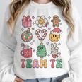 Team TK Teacher Christmas Groovy Smile Face Girl Boy Kid TK Unisex Sweatshirt, novelty gifts, funny gifts Team TK Teacher Christmas Groovy Smile Face Girl Boy Kid TK Unisex Sweatshirt, novelty gifts, funny gifts