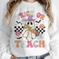Trick Or Teach Groovy Teacher Halloween Retro Floral Ghost Unisex Sweatshirt, novelty gifts, funny gifts Trick Or Teach Groovy Teacher Halloween Retro Floral Ghost Unisex Sweatshirt, novelty gifts, funny gifts