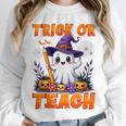 Trick Or Teach Teacher Halloween Ghost Pencil Floral Unisex Sweatshirt, novelty gifts, funny gifts