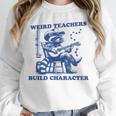 Weird Teachers Build Character Shirt Raccoon Teacher Unisex Sweatshirt, novelty gifts, funny gifts Weird Teachers Build Character Shirt Raccoon Teacher Unisex Sweatshirt, novelty gifts, funny gifts