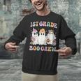 1st Grade Boo Crew Groovy Halloween Floral Ghost Kid Teacher Unisex Sweatshirt, Groovy Teacher Sweatshirts, gift for family, gift for coworker 1st Grade Boo Crew Groovy Halloween Floral Ghost Kid Teacher Unisex Sweatshirt, Groovy Teacher Sweatshirts, gift for family, gift for coworker