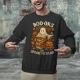 Books Are Spooktacular Ghost Book Reading Halloween Teachers Unisex Sweatshirt, gift for family, gift for coworker Books Are Spooktacular Ghost Book Reading Halloween Teachers Unisex Sweatshirt, gift for family, gift for coworker