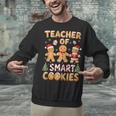 Christmas Teacher Of Smart Cookies Gingerbread Man Teaching Unisex Sweatshirt, gift for family, gift for coworker Christmas Teacher Of Smart Cookies Gingerbread Man Teaching Unisex Sweatshirt, gift for family, gift for coworker