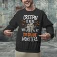 Creepin It Real With My 1st Grade Monsters Halloween Teacher Unisex Sweatshirt, gift for family, gift for coworker Creepin It Real With My 1st Grade Monsters Halloween Teacher Unisex Sweatshirt, gift for family, gift for coworker
