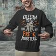 Creepin It Real Pre-K Monsters Halloween Preschool Teacher Unisex Sweatshirt, gift for family, gift for coworker Creepin It Real Pre-K Monsters Halloween Preschool Teacher Unisex Sweatshirt, gift for family, gift for coworker