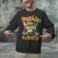Dinosaurs Didn't Read Now They Are Extinct Reading Teacher Unisex Sweatshirt, gift for family, gift for coworker Dinosaurs Didn't Read Now They Are Extinct Reading Teacher Unisex Sweatshirt, gift for family, gift for coworker