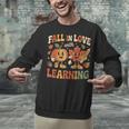 Fall In Love With Learning Retro Autumn Thanksgiving Teacher Unisex Sweatshirt, gift for family, gift for coworker Fall In Love With Learning Retro Autumn Thanksgiving Teacher Unisex Sweatshirt, gift for family, gift for coworker