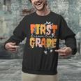 First Grade Dream Retro Team Fall Halloween Spooky Teachers Unisex Sweatshirt, First Grade Teacher Sweatshirts, gift for family, gift for coworker First Grade Dream Retro Team Fall Halloween Spooky Teachers Unisex Sweatshirt, First Grade Teacher Sweatshirts, gift for family, gift for coworker