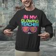 In My Glowing Teacher Era Groovy Colorful Bright Unisex Sweatshirt, Groovy Teacher Sweatshirts, gift for family, gift for coworker