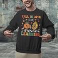 Groovy Fall In Love With Learning Autumn Pumpkin Teacher Unisex Sweatshirt, Groovy Teacher Sweatshirts, gift for family, gift for coworker Groovy Fall In Love With Learning Autumn Pumpkin Teacher Unisex Sweatshirt, Groovy Teacher Sweatshirts, gift for family, gift for coworker
