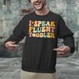 Groovy I Speak Fluent Toddler Daycare Provider Teacher Unisex Sweatshirt, Groovy Teacher Sweatshirts, gift for family, gift for coworker Groovy I Speak Fluent Toddler Daycare Provider Teacher Unisex Sweatshirt, Groovy Teacher Sweatshirts, gift for family, gift for coworker