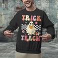 Groovy Teacher Halloween Retro Trick Or Teach Floral Ghost Unisex Sweatshirt, Groovy Teacher Sweatshirts, gift for family, gift for coworker