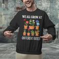 We All Grow At Different Rates Back To School Teacher Unisex Sweatshirt, gift for family, gift for coworker We All Grow At Different Rates Back To School Teacher Unisex Sweatshirt, gift for family, gift for coworker