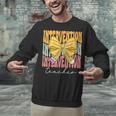 Interventionist Teacher Groovy Coquette Bow Back To School Unisex Sweatshirt, Groovy Teacher Sweatshirts, gift for family, gift for coworker