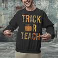 Leopard Trick Or Teach Halloween Teacher Costume Women Unisex Sweatshirt, gift for family, gift for coworker Leopard Trick Or Teach Halloween Teacher Costume Women Unisex Sweatshirt, gift for family, gift for coworker