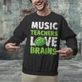 Music Teachers Love Brains Cute Teaching Halloween Unisex Sweatshirt, gift for family, gift for coworker Music Teachers Love Brains Cute Teaching Halloween Unisex Sweatshirt, gift for family, gift for coworker