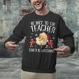 Be Nice To The Teacher Santa Is Watching School Christmas Unisex Sweatshirt, gift for family, gift for coworker Be Nice To The Teacher Santa Is Watching School Christmas Unisex Sweatshirt, gift for family, gift for coworker