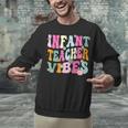 Retro Infant Teacher Vibes Women Daycare Teacher Unisex Sweatshirt, gift for family, gift for coworker Retro Infant Teacher Vibes Women Daycare Teacher Unisex Sweatshirt, gift for family, gift for coworker