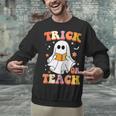 Retro Vintage Groovy Trick Or Teach Teacher Halloween For Men Women Kids Unisex Sweatshirt, Groovy Teacher Sweatshirts, gift for family, gift for coworker