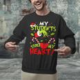 My Students Stole My Heart Teacher Holiday Merry Christmas Unisex Sweatshirt, gift for family, gift for coworker My Students Stole My Heart Teacher Holiday Merry Christmas Unisex Sweatshirt, gift for family, gift for coworker