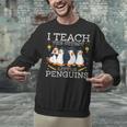 I Teach The Cutest Little Penguins Cute School Teacher Tee Unisex Sweatshirt, gift for family, gift for coworker I Teach The Cutest Little Penguins Cute School Teacher Tee Unisex Sweatshirt, gift for family, gift for coworker