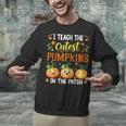 I Teach The Cutest Pumpkins Halloween Teacher Unisex Sweatshirt, gift for family, gift for coworker I Teach The Cutest Pumpkins Halloween Teacher Unisex Sweatshirt, gift for family, gift for coworker