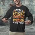 I Teach The Cutest Pumpkins Tshirt Halloween Teacher Unisex Sweatshirt, gift for family, gift for coworker I Teach The Cutest Pumpkins Tshirt Halloween Teacher Unisex Sweatshirt, gift for family, gift for coworker