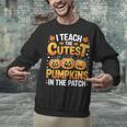 I Teach The Cutest Pumpkins Shirt Teachers Halloween Unisex Sweatshirt, gift for family, gift for coworker I Teach The Cutest Pumpkins Shirt Teachers Halloween Unisex Sweatshirt, gift for family, gift for coworker