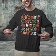 Teacher Christmas Alphabet Back To School Holiday Learning Unisex Sweatshirt, gift for family, gift for coworker Teacher Christmas Alphabet Back To School Holiday Learning Unisex Sweatshirt, gift for family, gift for coworker