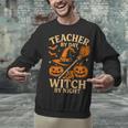 Teacher By Day Witch By Night Halloween Teacher Witch Unisex Sweatshirt, gift for family, gift for coworker