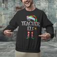 The Teacher Elf Shirt Matching Family Christmas Elf Men Women Kids Unisex Sweatshirt, gift for family, gift for coworker The Teacher Elf Shirt Matching Family Christmas Elf Men Women Kids Unisex Sweatshirt, gift for family, gift for coworker