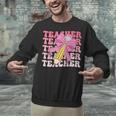 Teacher Pencil Back To School Groovy Pink Teacher First Day Unisex Sweatshirt, Groovy Teacher Sweatshirts, gift for family, gift for coworker