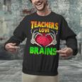 Teacher Teachers Love Brains Skeleton Hand Heart Halloween Unisex Sweatshirt, gift for family, gift for coworker Teacher Teachers Love Brains Skeleton Hand Heart Halloween Unisex Sweatshirt, gift for family, gift for coworker